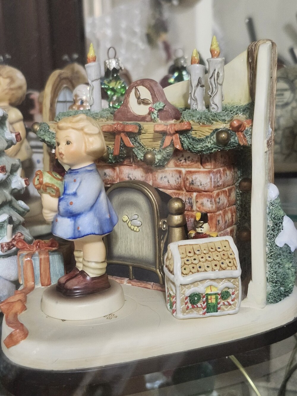 Hummel Blue-Coated Child Figurine with Festive Fireplace Scene